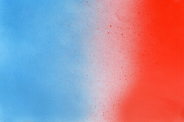 red and blue spray paint on a white color paper background