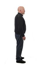 side view of a man standing on white background