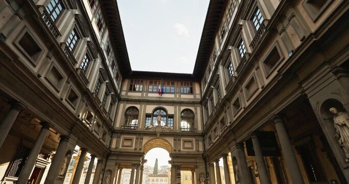 Beautiful arched courtyard architect in Florence, Italy. Tourist historical European city. High quality 4k footage