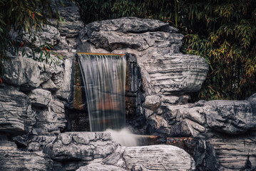 stone wall and waterfall