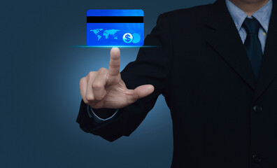 Businessman pressing credit card over light blue background, Online e-payment concept, Elements of this image furnished by NASA