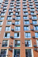 the facade of a multi-store residential building