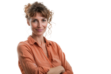 woman with folded arms and a warm smile, conveying authority with approachability.