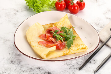 Russian pancake with salmon fish