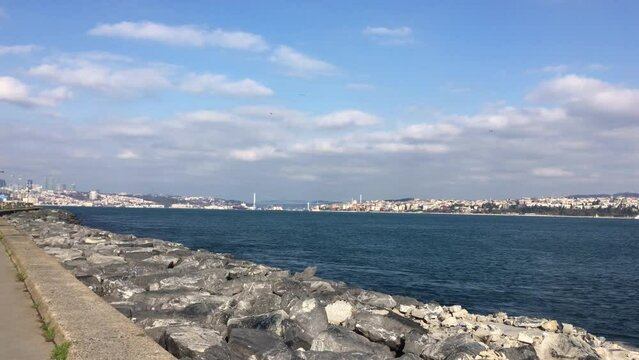 A cargo ship navigating the Bosporus Strait in Istanbul