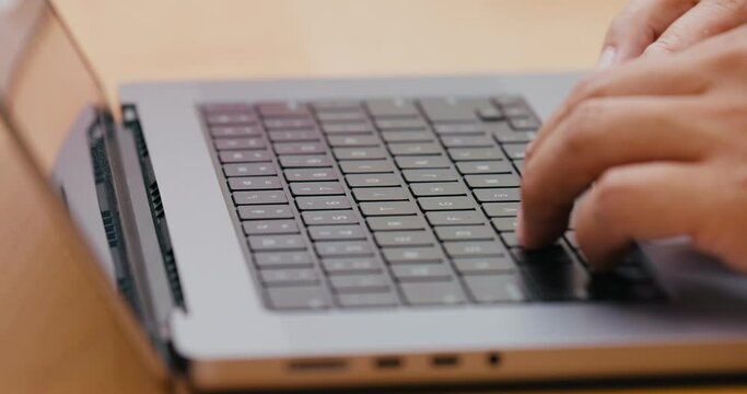 Hand type on laptop computer
