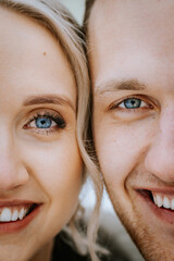 Riga, Latvia - January 20, 2024 - A close-up of a bride and groom's faces, focusing on their eyes and smiles, hinting at a joyful moment.