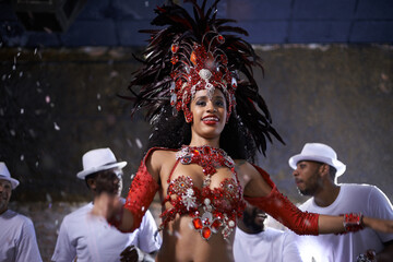 Woman, dance and samba for music festival, carnival or street performance with costume at night....