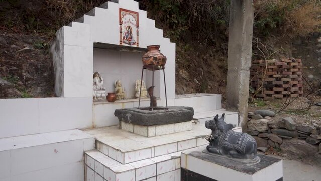 Shiva -Parvati Temple with Nandi Bull sotne sculptor. Hindu Gods .