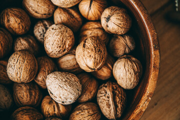 walnuts on wooden background. Nuts. Bowl. Eat. Cooking. Diet. 