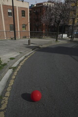Red balloon in the street 