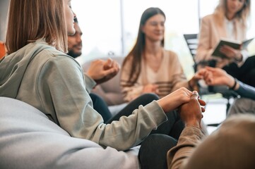 Conception of mental health, sitting and talking. Group of people are having therapy meeting...