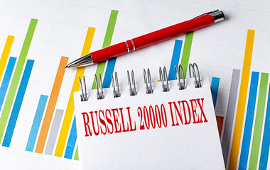 Russell 2000 Index. text on a notebook with chart and pen business concept