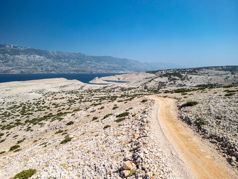Hiking and cycling routes on the Pag Island coastline near Jadra Beach, Stara Novalja and Zigljen, Croatia and the beautiful blue Adriatic sea
