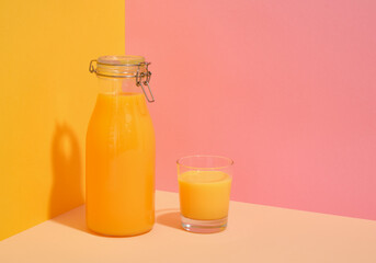 Orange fruit juice. Vegan alternative food. Copy space for text.