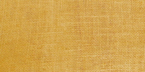 close up of beige colored fabric texture.