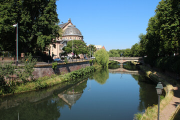 quay and ill river in strasbourg in alsace in france  - obrazy, fototapety, plakaty