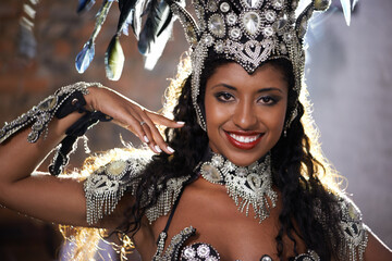 Happy woman, portrait and samba dancer with costume for performance at carnival or festival. Face...