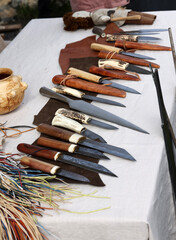  Handmade imitations of medieval knives in knight camp at the festival of historical reconstruction