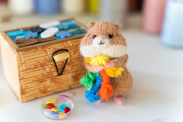 Knitted hamster toy with yarn and knitting accessories - 743657775