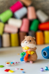 Knitted hamster toy with yarn and knitting accessories - 743657909