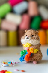 Knitted hamster toy with yarn and knitting accessories - 743657927