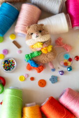 Knitted hamster toy with yarn and knitting accessories - 743658129