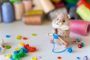 Knitted hamster toy with yarn and knitting accessories - 743658327