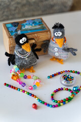 Knitted crow toys with decorations and shiny objects - 743658529