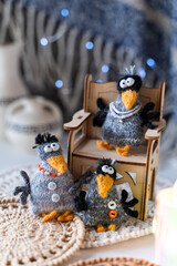 Knitted crow toys with decorations and shiny objects - 743658753