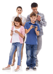 Family, phone and online in studio for communication with text message, conversation and video streaming. Father, mother and children with smartphone, technology and mobile chat on white background