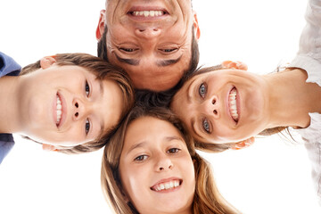 Portrait of mother, father and children on a white background for bonding, relationship and love. Family, happy and low angle of isolated mom, dad and kids for support, care and relax in studio