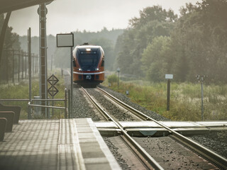 Railway at a small station in Estonia. Passenger transport. Railway tourism