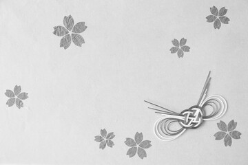 和紙の切り絵風デザイン　灰色の桜の花と水引結び（灰色の背景・モノクロ）