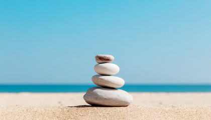 Stone balancing art on beach background