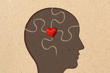 Profile silhouette of man with puzzle pieces and heart - Concept of psychology, love and mental health - 743680758
