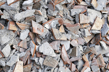 Piles of broken floor tiles from house renovations