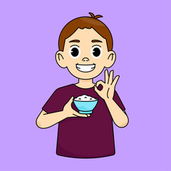Boy smiling and holding a bowl of rice and showing ok gesture