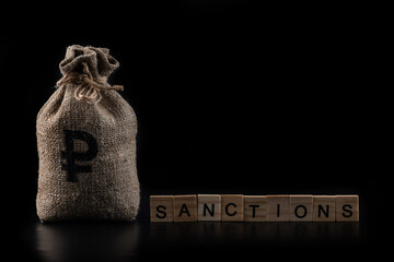 Money bag with Russian ruble symbol and the word 