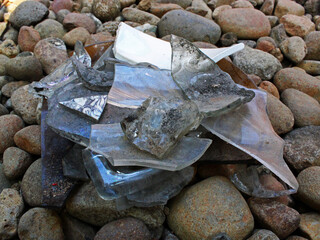 Close-up of fragment of plate on the gravel. 
