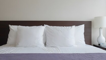 Fototapeta na wymiar Pillow on bed decoration interior of room