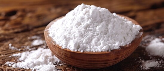Succinic acid, white powder used to regulate acidity in food.