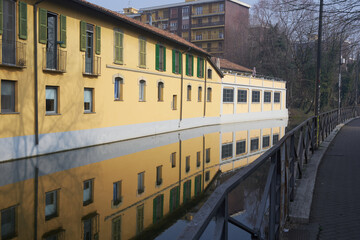 Picturesque scene of Milan's Naviglio Martesana, a peaceful haven amidst the bustling city. - 743767522