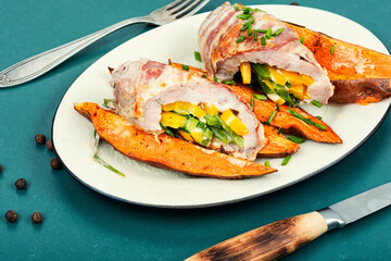 Meat roulade and roasted sweet potatoes.