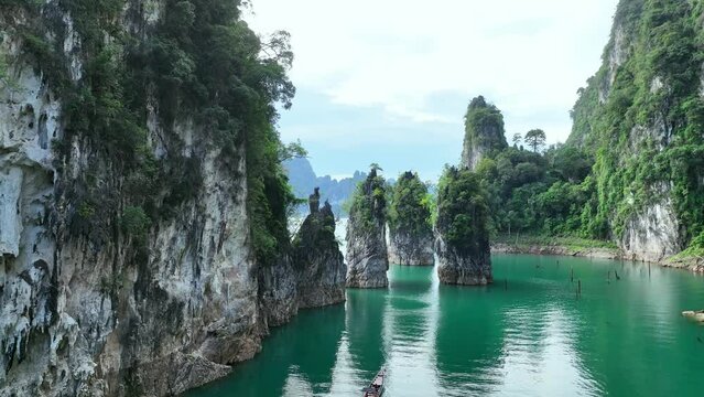 Khao Sok national park Cheow Lan Dam lake with blue sky background in Surat Thani, Thailand.	