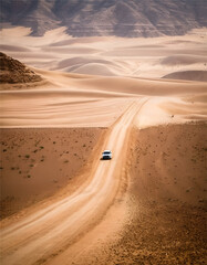 desert landscape and car