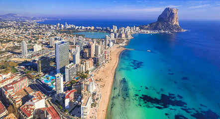 Costa Blanca, Spain. Aerial drone panoramic view of coastal city Calpe with great beaches. Alicante province. - 743785171