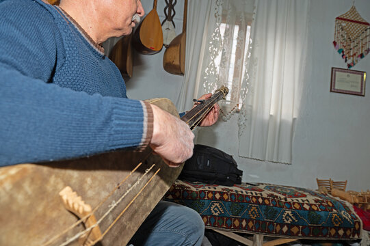 Guembri is a musical instrument typical of Moroccan culture. It is also known as Gimbri, Sintir or Hejhoujis.