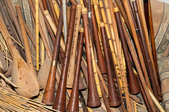 Various wind instruments in a workshop warehouse where musical instruments are made.