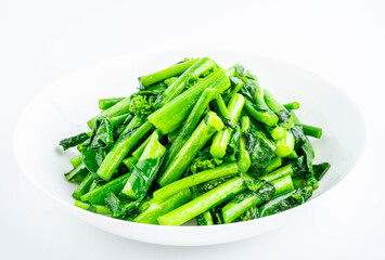 A plate of fried rapeseed greens
